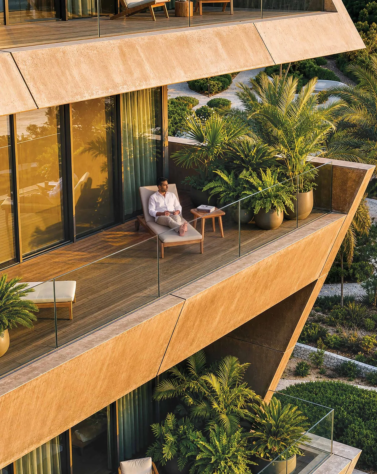 Brigade Barcelona — resident on a deep lake-facing balcony at Neopolis, Kokapet
