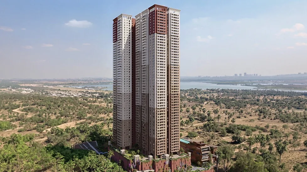 Brigade Barcelona tower at Neopolis, Kokapet, with the Outer Ring Road and the Financial District corridor beyond